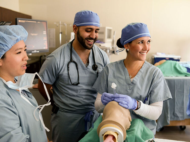 Nurse anesthesia students practicing intubation procedures in the skills lab