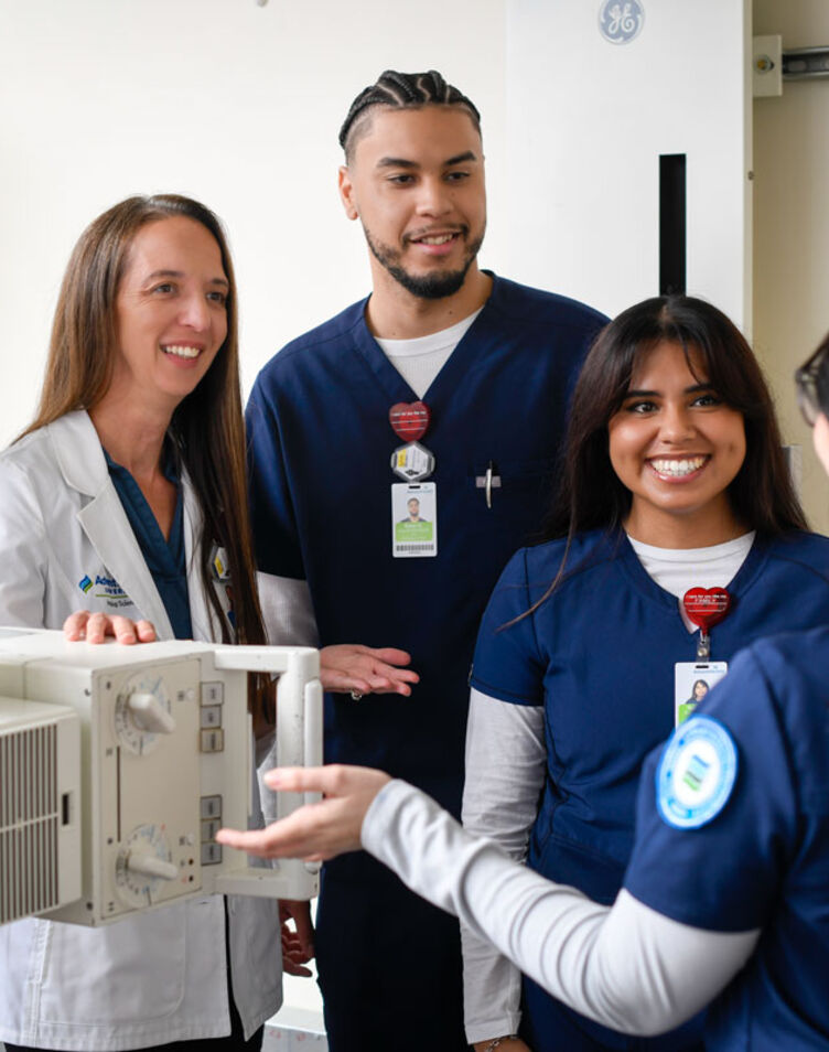 Professor and students in radiography lab